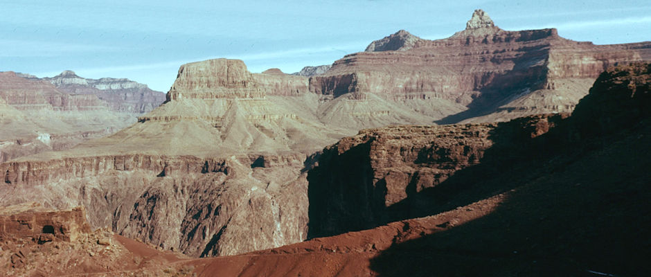 Zoroaster Temple (right) from trail within inner gorge, Sumner Butte across Colorado Granite Gorge, Bright Angel Canyon on left - Grand Canyon National Park - Dec 1961 Zoroaster Temple (right) from trail within inner gorge, Sumner Butte across Colorado Granite Gorge, Bright Angel Canyon on left - Grand Canyon National Park - Dec 1961