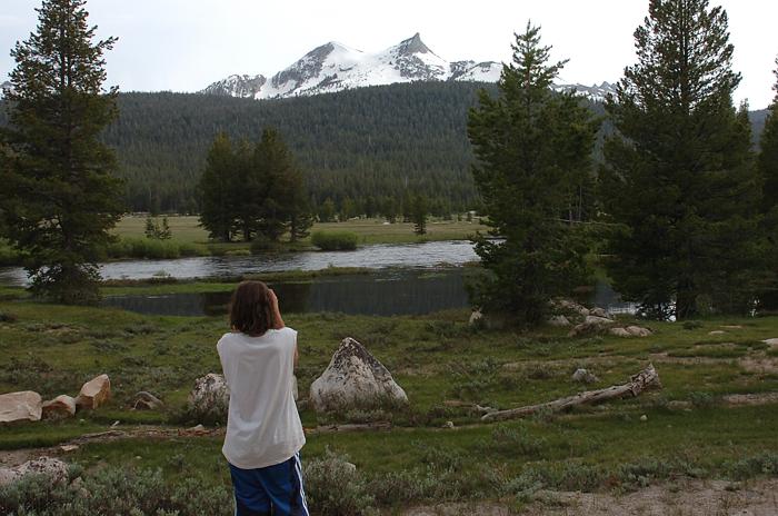 Andrew taking photo of Unicorn Peak across the Tuolumne River and Tuolumne Meadow