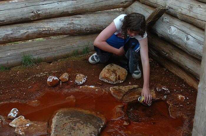 Andrew sampling the water at Soda Spring