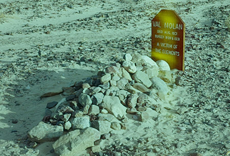 Val Nolan was a miner who was last seen in Beatty, Nevada shortly before he died. He died in the intense summer heat of Death Valley and was found by a movie crew three months later, who buried him where they found him. His grave is off the dirt road going to the sand dunes near Stovepipe Wells - Death Valley - Jan 1959