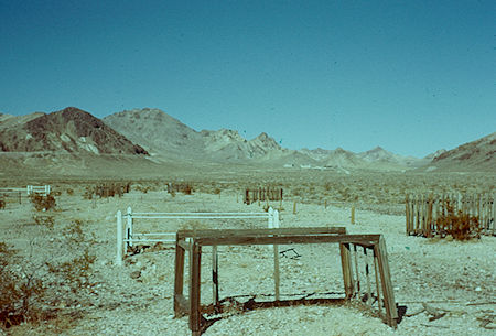 The Rhyolite-Bullfrog cemetery, with many wooden headboards, is slightly south of Rhyolite - Rhyolite - Jan 1959