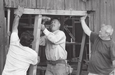 Mike Patterson (center) with volunteers calling themselves the Cerro Gordo Volunteer Fire Department doing re-timbering repairs in 2005 (Explore Historic California Collection)