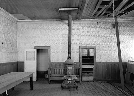 Interior, showing stove and metal wall covering - U. S. Land Office Building Interior, showing stove and metal wall covering - U. S. Land Office Building