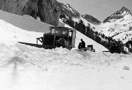RD7 Caterpillar dozers pulling supply sleds over Morgan Pass in 1938