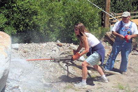 Pine Creek Mine - Pete instructing tour member Cat in use of Jack Leg drill