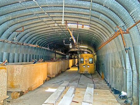 Electric Mules and Ore Cars in storage in the Snow Tunnel