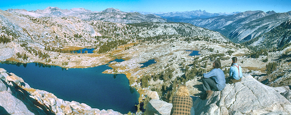 Chief Lake, Papoose Lake (left), Mt. Ritter and Banner Peak (right skyline), Cascade Valley (right} from Silver Pass, Randy Stevenson, Marty Nikolaus, Gil Beilke - John Muir Wilderness 31 Aug 1976