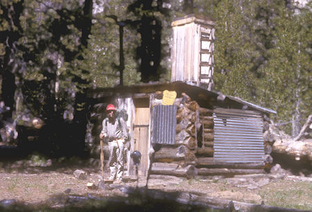 Bill Paine at snow cabin at the forks of Buckey Creek -  27 Aug 1965