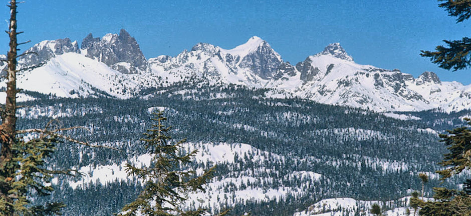 Minarets, Mt. Ritter, Banner Peak from valley rim - Devil's Postpile area 18 Feb 1973 Minarets, Mt. Ritter, Banner Peak from valley rim - Devil's Postpile area 18 Feb 1973