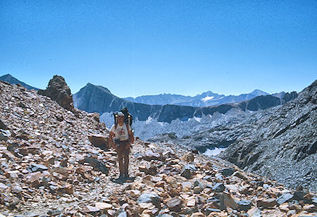 Mt. Crocker, Hopkins Pass, Mt. Mills (rear), Stan Haye on McGee Pass Trail<br>John Muir Wilderness 29 Aug 1976 Mt. Crocker, Hopkins Pass, Mt. Mills (rear), Stan Haye on McGee Pass Trail<br>John Muir Wilderness 29 Aug 1976
