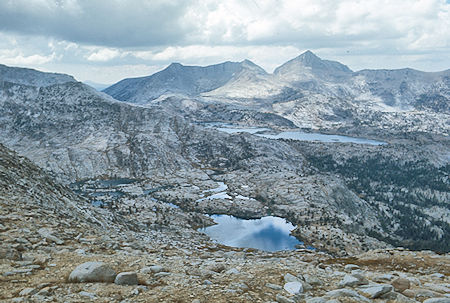 Sandpiper Lake, Marie Lakes and Mt. Hooper from slope descending Seven Gables - John Muire Wilderness 07 Sep 1976