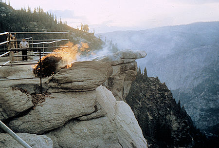 The fire burning with Hanging Rock in the background - Yosemite National Park Jul 1957