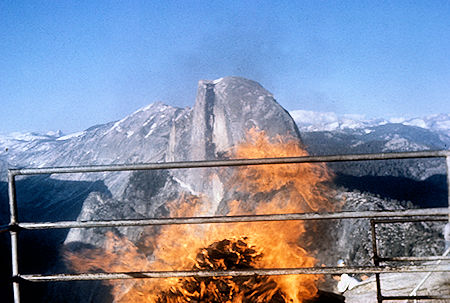 The fire burning with Half Dome in the background - Yosemite National Park Jul 1957