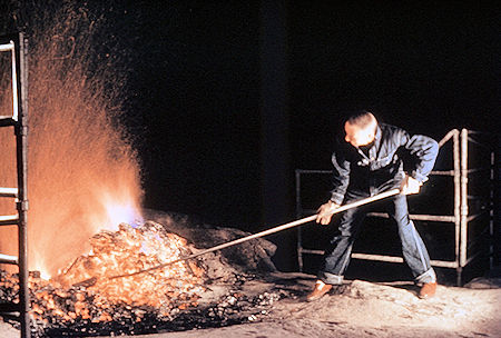 Pushing the burning embers over the cliff - Yosemite National Park Jul 1957 Pushing the burning embers over the cliff - Yosemite National Park Jul 1957