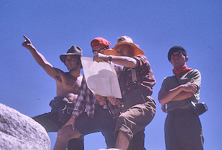 Richard Alvernez, Dale Caldwell, Gil Beilke, Tim McSweeney check the map on top of Fin Dome<br>Kings Canyon National Park 31 Aug 1970 Richard Alvernez, Dale Caldwell, Gil Beilke, Tim McSweeney check the map on top of Fin Dome<br>Kings Canyon National Park 31 Aug 1970