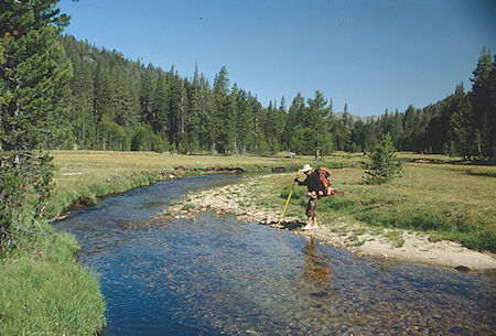 Gil Beilke crossing creek in Upper Piute Meadow - Hoover Wilderness 1992 Gil Beilke crossing creek in Upper Piute Meadow - Hoover Wilderness 1992