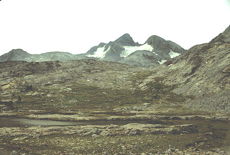 From Marie Lakes I descended a gully to Rodgers Lakes.  Then proceeded up the slope shown here to a saddle above Davis Lakes.  Mt. Davis in the background - Ansel Adams Wilderness - Aug 1988