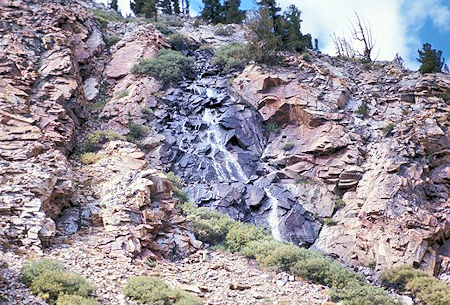 A cascade seen from the trail below Lower Sardine Lake A cascade seen from the trail below Lower Sardine Lake