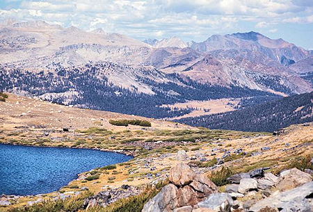 View from Helen Lake down the Dana Fork shows the Dana Meadows. Tioga Pass is just beyond the right end of the meadows View from Helen Lake down the Dana Fork shows the Dana Meadows. Tioga Pass is just beyond the right end of the meadows