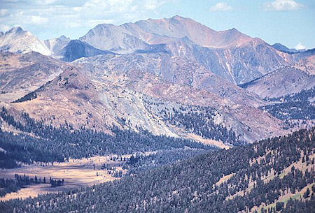 In this telephoto picture from Helen Lake you can see the Tioga Pass road along the far side of Dana Meadows. The pass and entrance station are just beyond the end of the meadow .. diagonally down from the grassy saddle on the left edge of the picture In this telephoto picture from Helen Lake you can see the Tioga Pass road along the far side of Dana Meadows. The pass and entrance station are just beyond the end of the meadow .. diagonally down from the grassy saddle on the left edge of the picture