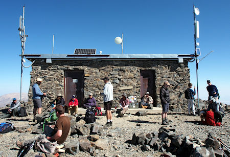 Hikers resting at the summit hut on the 2018 open gate day