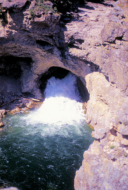 Natural Bridge Falls coming through tunnel at low water