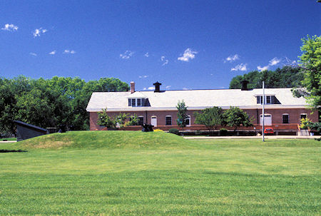 Main Museum Building, formerly Quartermaster's Storehouse. The mound in the front is the Quartermaster's Root Celler