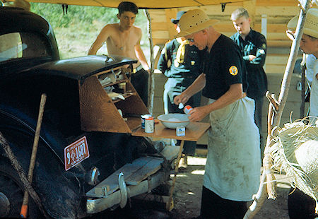 'Doc' Loomis mixing  his famous bisquit batter at Zastro Camp