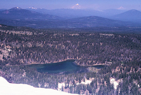 Mt. Jefferson and Mt. Hood over Little Three Creek Lake from the Tam McArthur Rim in Three Sisters Wilderness near Sisters, Oregon (fire smoke)
