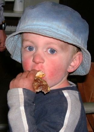 Patrick Glenn chowing down on an Egg McMuffin after returning to base