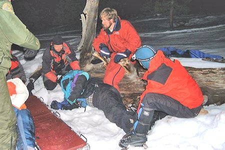 Night rescue exercise - placing the stretcher to receive the victim