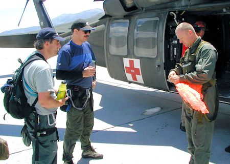 Steve and Jan discuss operation with winch operator