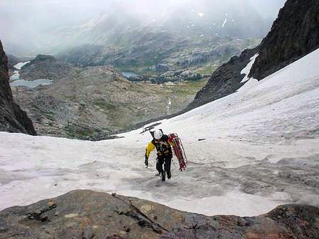 Dragging the litter up the hill.  Notice the rocks on the glacier. That's because lightning hit Ritter at 8 a.m.!