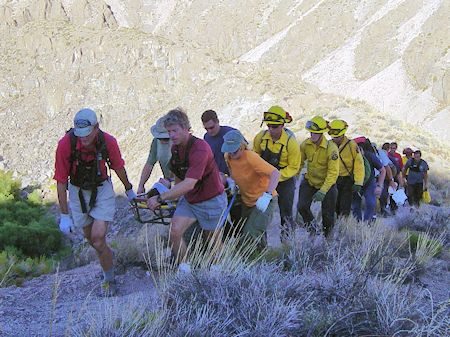 Ops 03-29 - Transporting injured climber in wheeled litter