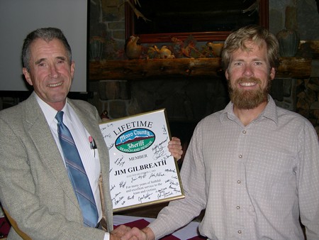 Jim Gilbreath receiving Lifetime Membership Award from President Greg Enright