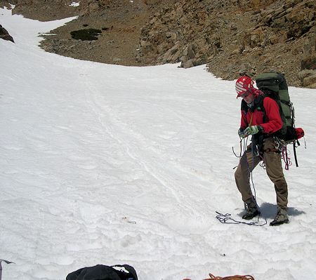 Track of subjects slide down the snow can be seen as preparations start for belaying him down the slope - DM Photo