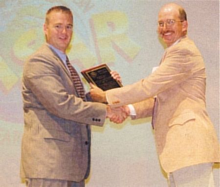Sargent Weber receiving award from Randy Servis, NASAR President
