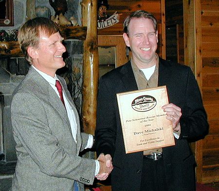 Dave Michalski receiving Member of Year Award from Jeff Holmquist - December 14, 2004