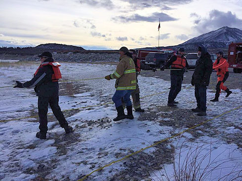 Hauling team on the shore