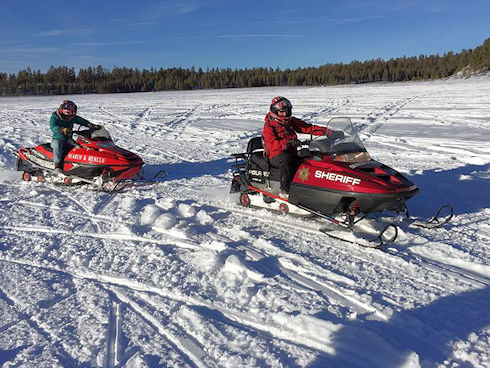 Snowmobile towing