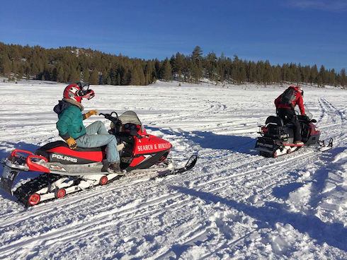 Snowmobile towing