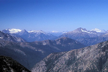Snowfield Peak (left), Crater Mountain (right), Mt. Baker in distance on the right, from 7,440' Slate Peak near Harts Pass, Washington