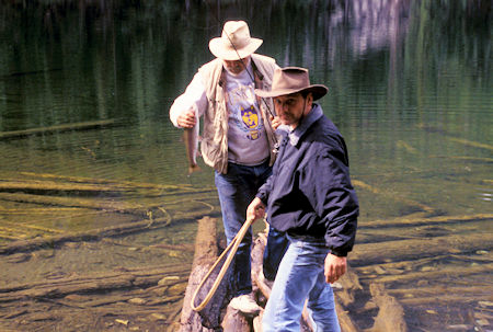 Whidbey Island print shop owner and Radio Shack owner land a trout at Black Lake, Pasayten Wilderness, north of Winthrop, Washington