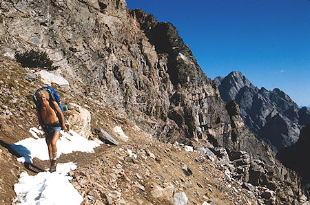 Randy Stevenson arriving at Paintbrush Divide, Mount Moran in back - Grand Teton National Park 1977